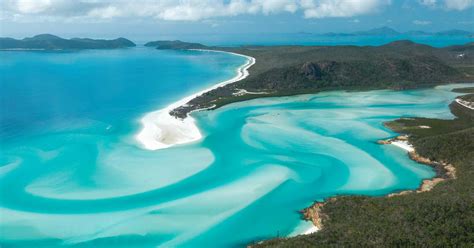 whitehaven beach tours from hamilton island  Daily tours depart from Coral Sea Marina North (next to Sorrento Restaurant & Bar) in Airlie Beach and both Whitehaven Beach tours are also ideal for private charters